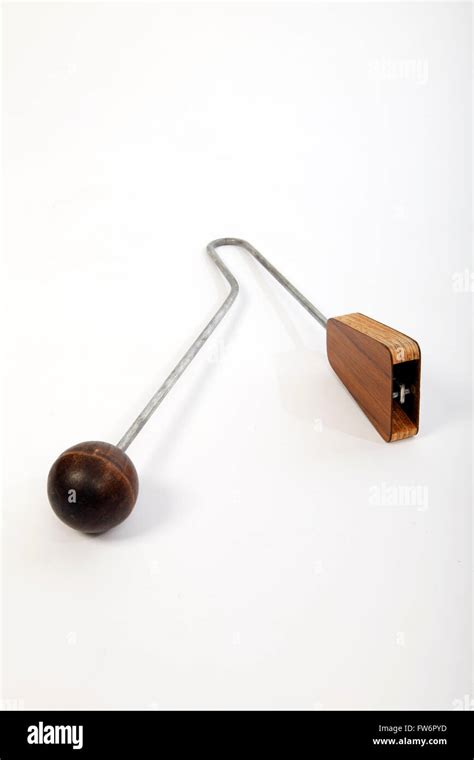 box instrument with metal spring inside|Vibraslap .